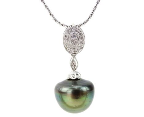15mm South Sea Baroque Black Pearl and 14 Karat White Gold Pendant Necklace with Small Diamond Accents. Pearl with good polis
