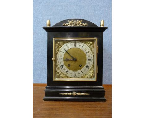 A late 19th Century German Lenzhirch ebonised and gilt metal mantel bracket clock 