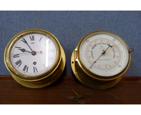 A brass ships style clock and aneroid barometer 
