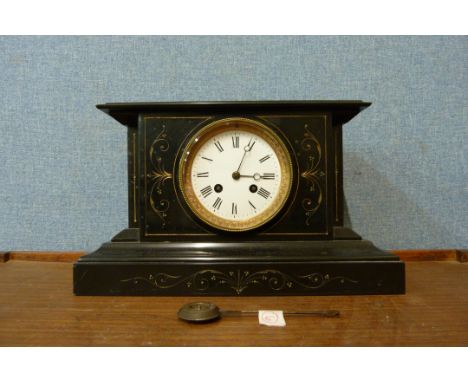 A 19th Century French Belge noir mantel clock 