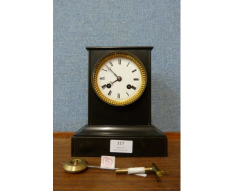 A 19th Century French Belge noir mantel clock 