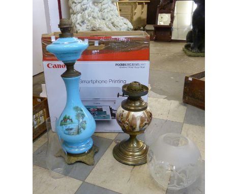 A Victorian turquoise glass oil lamp and one other 