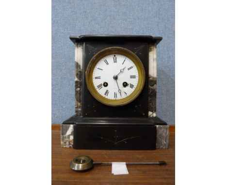 A 19th Century French Belge noir mantel clock 