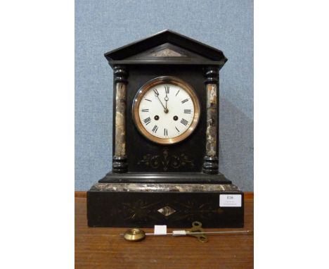 A 19th Century French Belge noir mantel clock 