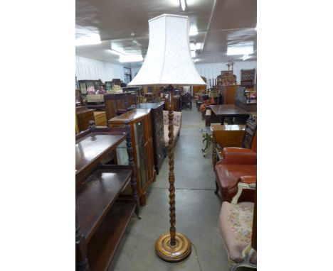An oak barleytwist standard lamp 