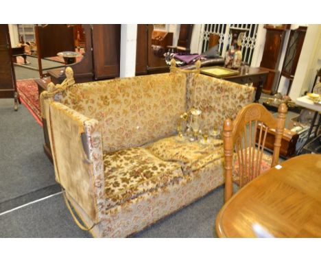 A 20th Century Knowle style drop arm sofa, upholstered in floral velvet