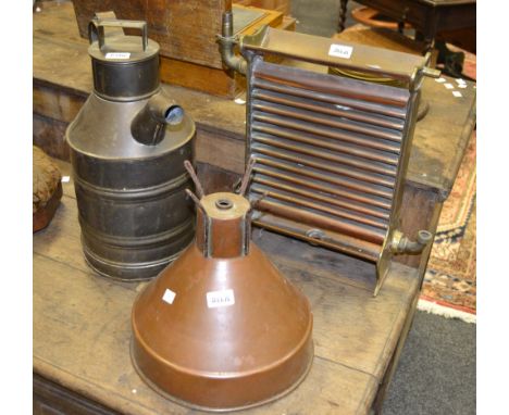 A milk cooler; a copper incubation lamp shade; a large milk jug 