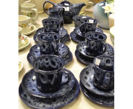 A contemporary stoneware part tea service