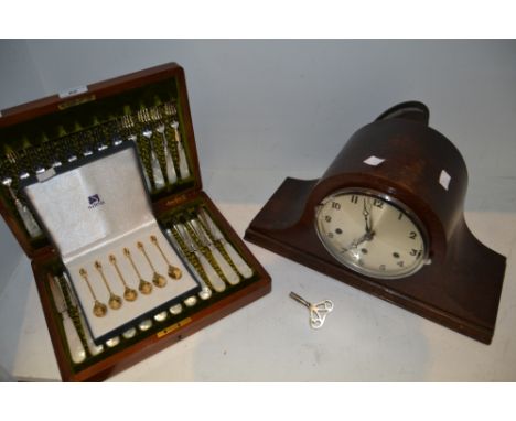 An oak Napoleon hat mantel clock, silvered dial;, c1930s;  a cased set of cake knives and forks,  mother of pearl handles;  a