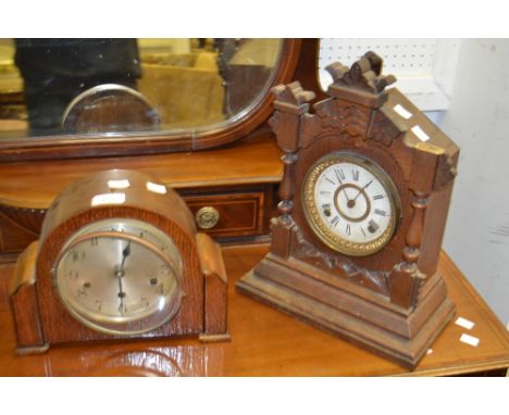A 20th Century oak mantel clock, Arabic numeral dial; another (2)