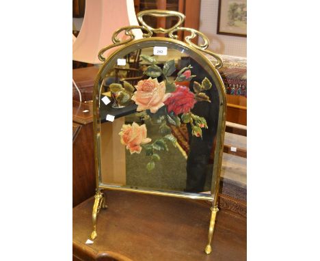 A brass and painted mirror firescreen c 1930's