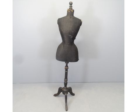 A vintage wasp-waisted shop display mannequin on stand. Height 153cm. 