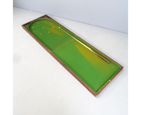 An antique folding table-top bagatelle game, with single cue and&nbsp; balls. Unfolded 184x57cm