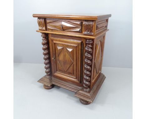 An antique Dutch buffet , with single frieze drawer, cupboard under and raised on bun feet. 92x112x66cm. With key. 