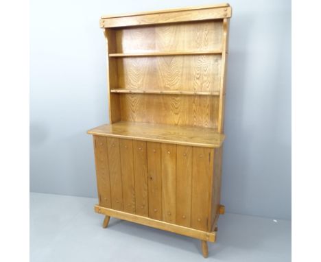 A mid-century Ercol style oak dresser with inset maker's label to back. 99x168x42cm (with key) 