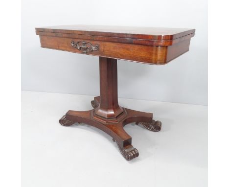 A Regency rosewood fold-over card table, raised on octagonal column with platform base. 92x73x45cmGood overall condition, wit