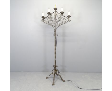 A wrought metal electric five light candelabra. Height 168cm. 