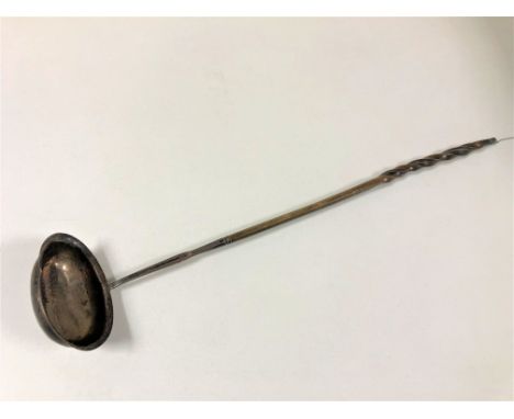 A silver toddy ladle with turned wooden handle  