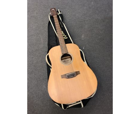 A Lorenzo Flame Series acoustic guitar in soft carry case