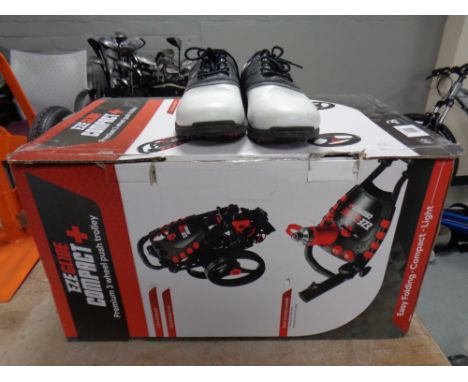 An Eze glide compact folding golf trolley (boxed) together with a pair of Dunlop golf shoes  