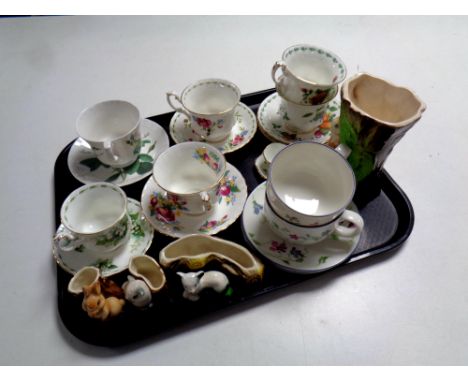A tray containing assorted ceramics to include Hornsea vases, Royal Doulton, Royal Albert teacups and saucers, a miniature Sa