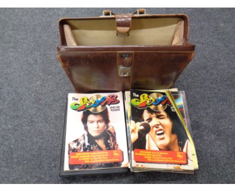 A vintage leather doctor's bag containing 1970s/80s Story of Pop magazines in folders  