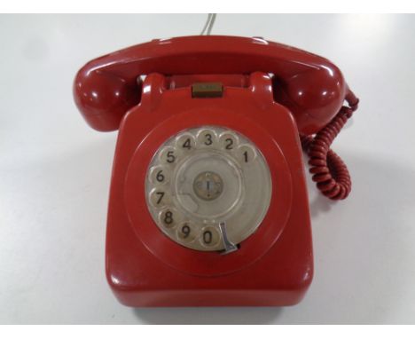 A vintage red telephone 