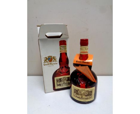 A vintage bottle of Le Grand Marnier, sealed in original box  