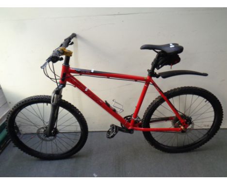 A Carrera XC Valkan Disc Spec front suspension mountain bike 