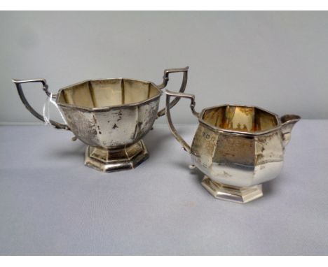 A Birmingham silver cream jug and sugar basin, hallmarks rubbed, 179g 