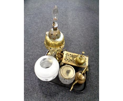 A tray of brass embossed oil lamp base, with glass shade, oil can, silver plated biscuit barrel etc 