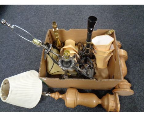 A box containing assorted table lamps to include wooden table lamps, metal table lamp with leaded glass shade etc  