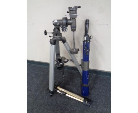 A Skylux telescope, a telescope stand and a camera tripod 