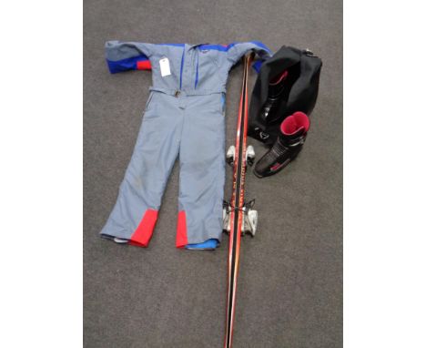 A pair of Fischer XTR 190 skis with bindings together with a pair of R Raichle ski boots, size 8.5, and a Birdhouse snow suit