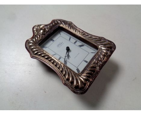 An R Carr silver fronted desk clock bearing Sheffield hallmarks   