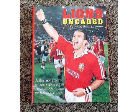 Rugby Union Lions Uncaged book by John Bentley signed on the inside page by the former England and British Lions player Austi