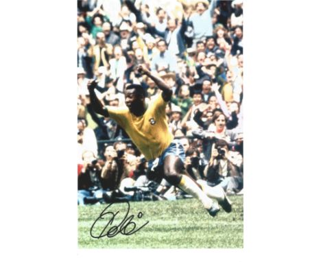 Football Pele signed 12x8 colour photo pictured in action for Brazil. Edson Arantes do Nascimento (born 23 October 1940), kno