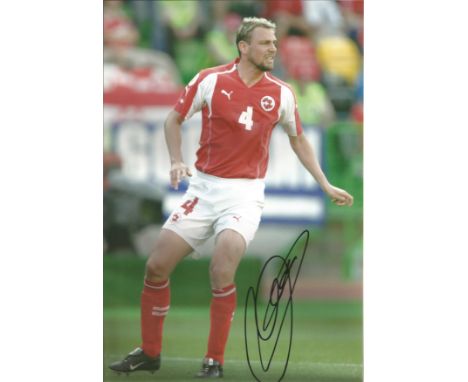 Football Stephane Henchoz signed 12x8 colour photo pictured in action for Switzerland. Stéphane Henchoz born 7 September 1974