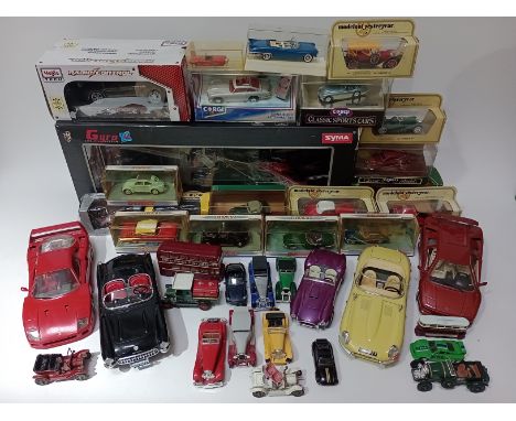 Two boxes of assorted die-cast model vehicles including Dinky and Corgi etc. 