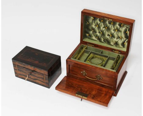 An antique walnut jewellery box with fitted interior, brass handle and key and an inlaid coromandel tea caddy with key.Condit