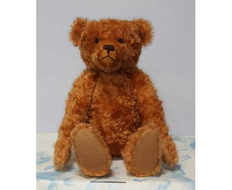 A large Steiff limited edition growling bear, with box.Dimensions (sat down):- Approx. 43cm high.