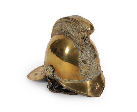 A Late 19th/Early 20th Century Brass Fireman's Helmet, the high comb with dragon decoration, with crossed axe and hose badge 