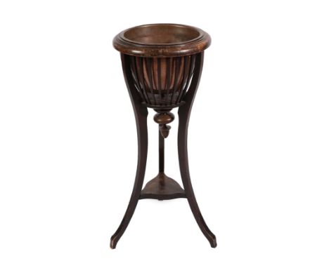 An Edward VII Mahogany Basket Jardiniere, having a copper liner, with turned pendant finial, on three legs joined by a triang