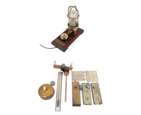 A Brass Mounted Ship's Light and Switch, on an oak stand inscribed HMS Vengeance 1944, 28cm long; A Late 19th Century Thermom