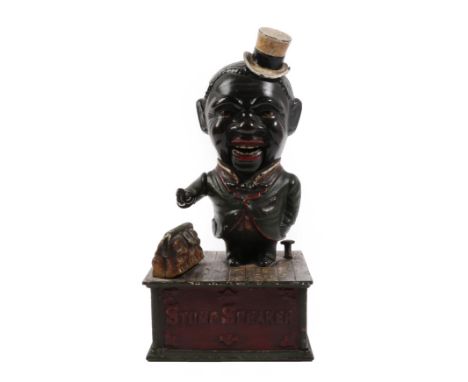 A Cast Iron Mechanical Money Box ''Stump Speaker'', modelled as a man wearing a top hat, a Gladstone bag at his side, on a re