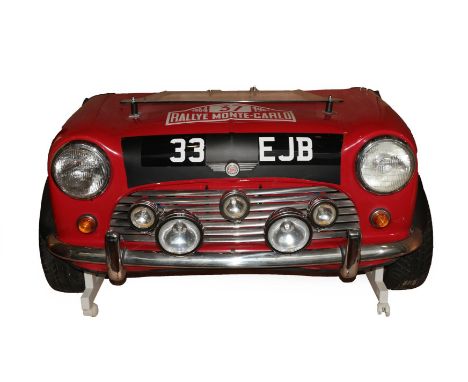 An Unusual 1964 Monte Carlo Rally Replica Mini Front End, in the form of a desk, modern, with glass shelf and a speedometer c