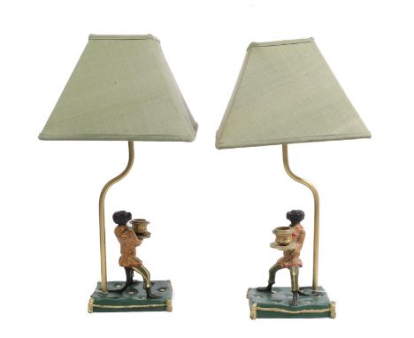 A Pair of Cold Painted and Gilt Metal Table Lamps, in 18th century style, each as a monkey in costume holding a sconce on a c