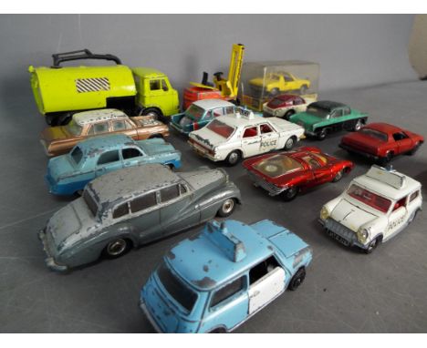 Dinky - A collection of 15 Dinky vehicles including # 167 AC Aceca, # 165 Humber Hawk, # 796 Healey Sports Boat. 14 of the mo