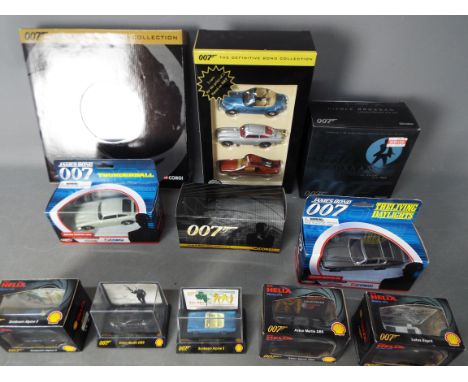 Corgi - Tic-Toc. A collection of 11 boxed James Bond related vehicles in various scales including # CC07505 Aston Martin Vanq