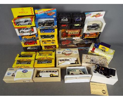 Mondo, Matchbox Dinky, Maisto, Corgi, Others - A collection of boxed diecast vehicles in various scales. Lot includes Mondo L